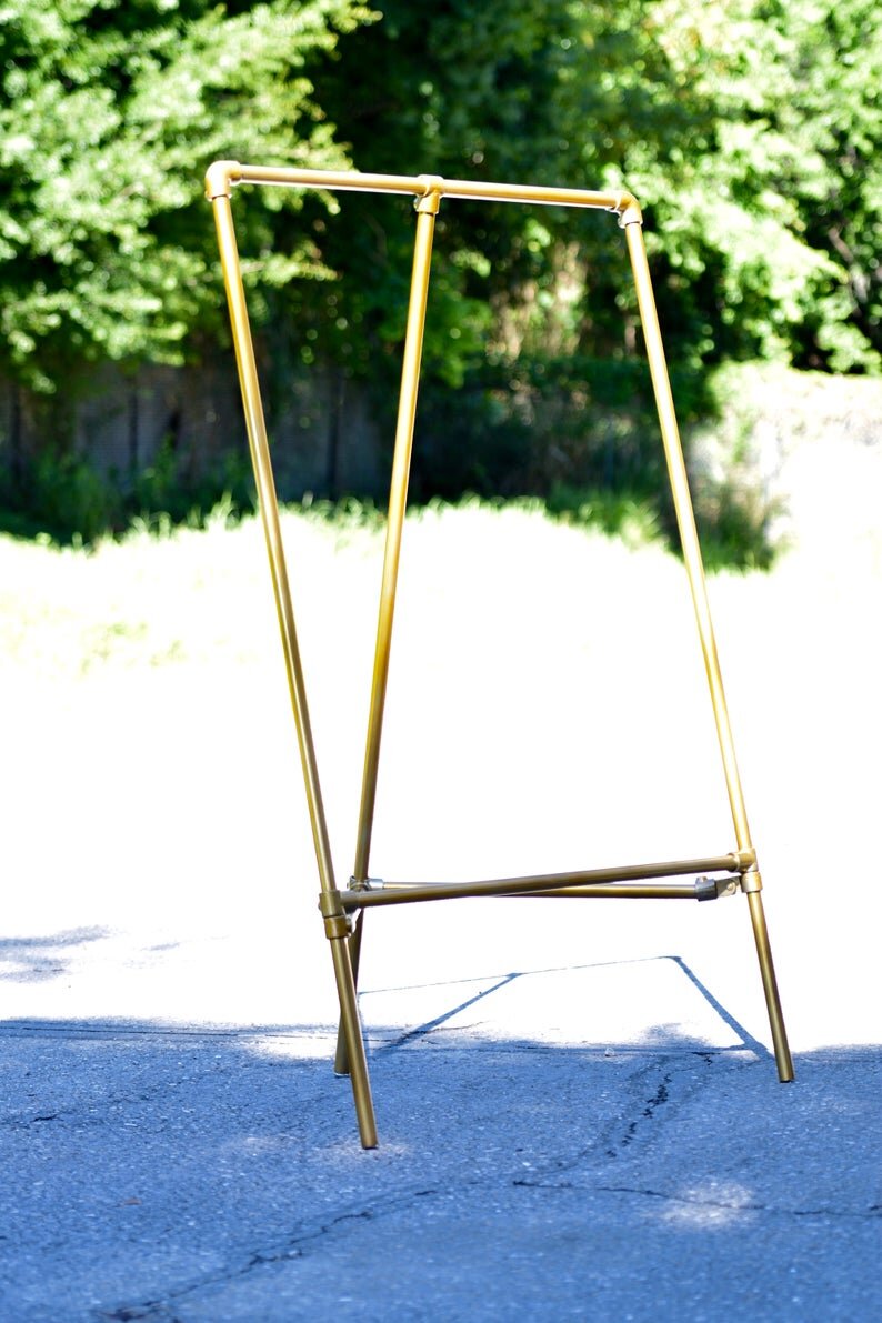 Gold Triangular Garment Rack