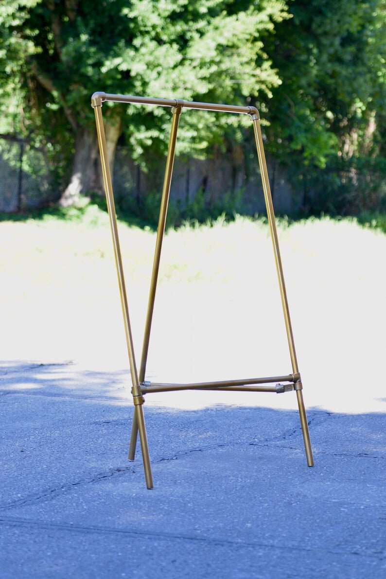 Gold Triangular Garment Rack