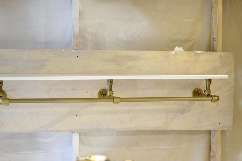 Gold Wall Mounted Clothing Rack With Shelf