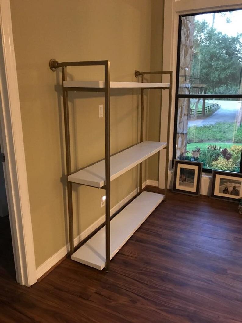 Gold and White Shelves for Shoes and Handbags Retail Display